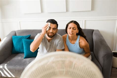 Couple Sitting Front Fan During Hot Weather Royalty Free Images Stock Photos Pictures