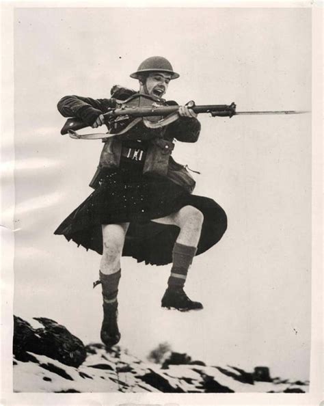 Flying Through The Air A Kilted Member Of The Queen S Own Cameron Highlanders Practices His