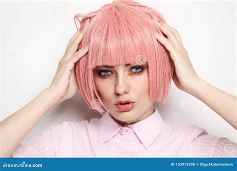 Vintage Style Portrait Of Beautiful Woman In Fancy Pink Wig Touching