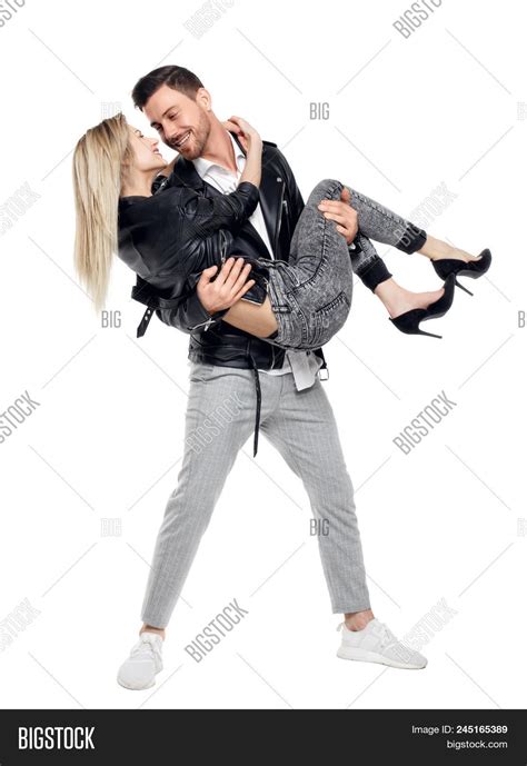 Guy Holding Girl Up With Telegraph