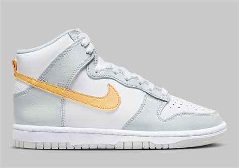 Nike Dunk High Grey Yellow Swoosh Oval | SneakerNews.com