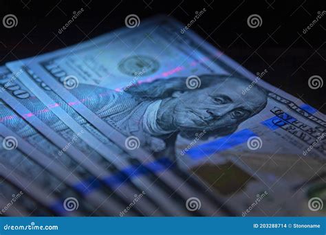 100 Dollars Banknot Currency In Uv Light Protectiondollars In Uv Light