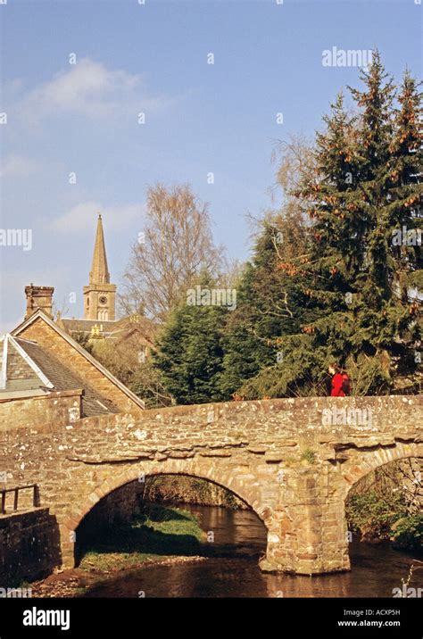 Walker Crossing The Packhorse Bridge Alyth Stock Photo Alamy