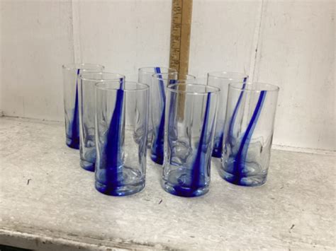 8 DRINKING GLASSES WITH BLUE ACCENT