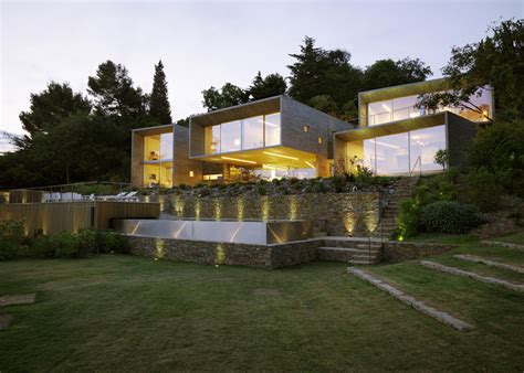 Concrete House In Maison Le Cap Features Mirrored Glazing