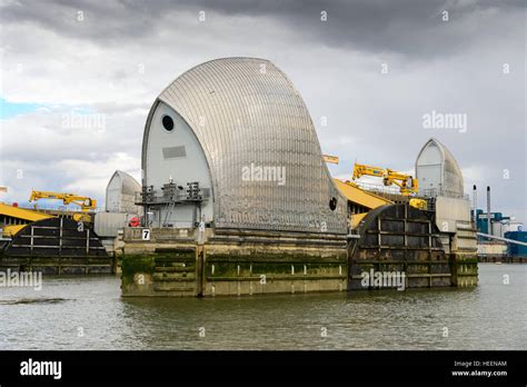 One Of The Rotating Gates Of The Thames Flood Barrier That Spans The