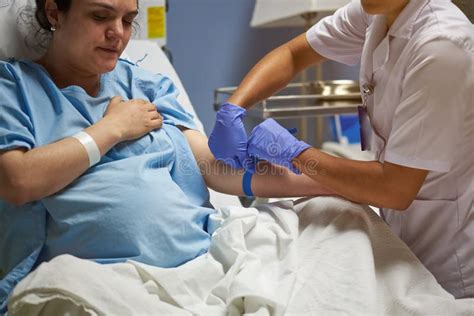 Doctor Taking Care Of Woman Patient Stock Image Image Of Doctor