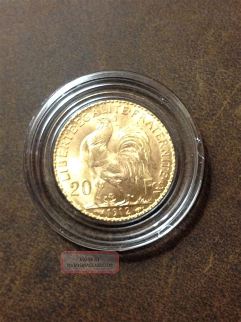 1912 French 20 Franc Rooster Gold Coin Agw. 1867 Oz.