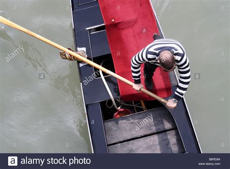 Gondolier In Venice Italy Stock Photo Alamy