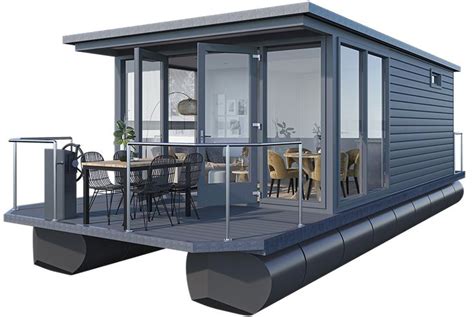 A Houseboat Is Floating On The Water With Its Balcony And Living Room