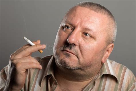 Fat Man Smoking Cigarette Stock Photo Image Of Closeup 63031096