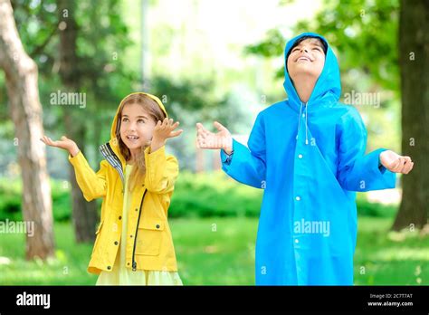 Wearing Raincoats Hi Res Stock Photography And Images Alamy