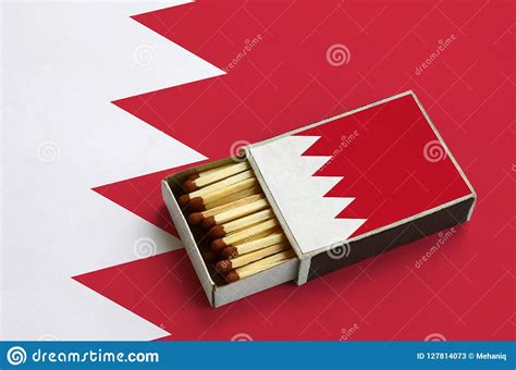 Bahrain Flag Is Shown In An Open Matchbox Which Is Filled With Matches