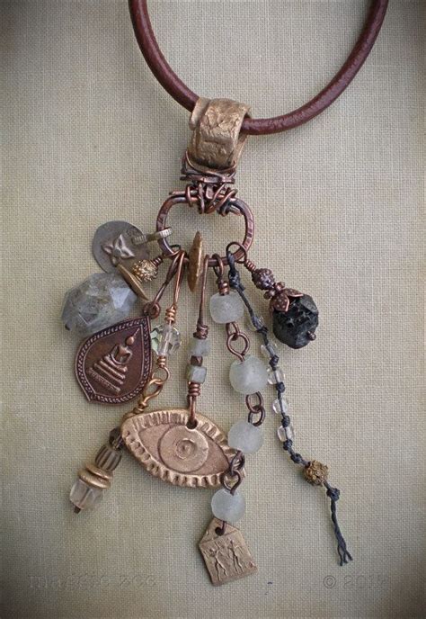 A Necklace With Many Charms Hanging From It