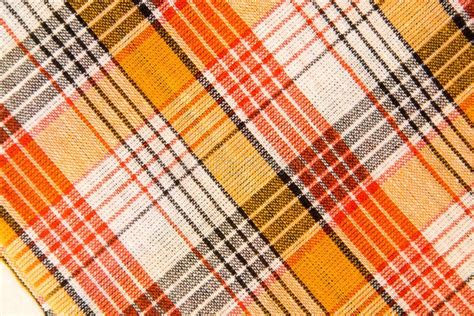 The Texture Of White Checkered Orange Red Black Cotton Fabric Stock