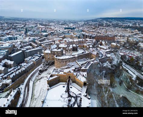 Aerial view of winter snow covered Edinburgh Castle in Edinburgh ...