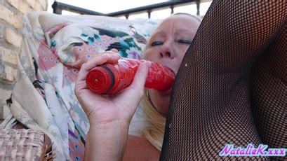 Solo Slut Natalie K Makes Herself Happy With A Red Dildo Photos