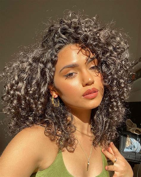 25 Photos That Will Make You Want Curly Bangs