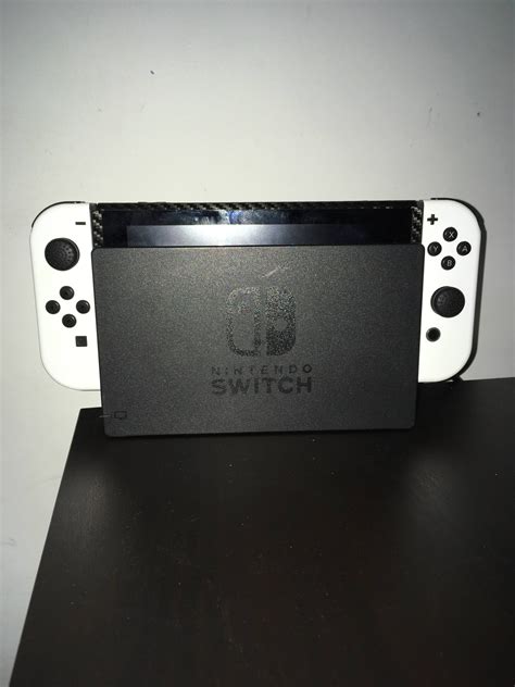 Nintendo switch with white joycon skins and carbon fiber system skin ...