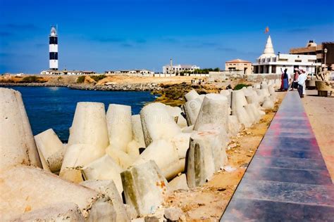 The Ghats Of Dwarka With Dwarkadhish Temple On The Bank On River Gomti