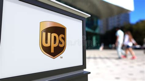 Street Signage Board With United Parcel Service UPS Logo. Blurred ...