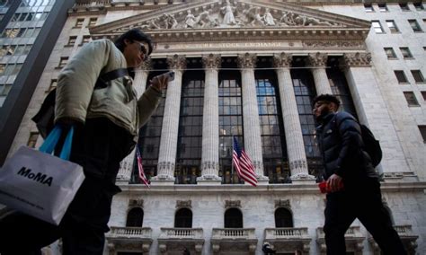 Wall Street abre al alza a la espera de más pistas desde la Fed y el