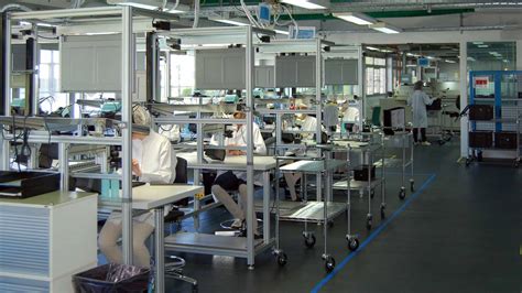 Manual Assembly Operators With The Precision Of Swiss Watchmakers