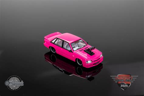 holden vk commodore pink meanie oz wheels  diecast expo