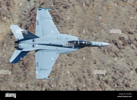 United States Navy F A 18f Super Hornet Jet Fighter Flying At Low Level Through Rainbow Canyon