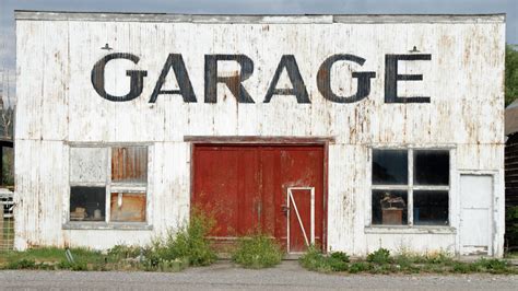 Download Abandoned Vintage Garage Repair Shop Wallpaper