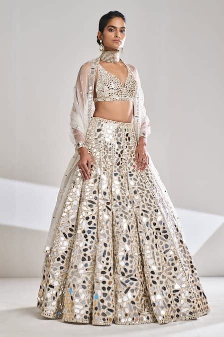 Buy Cream Raw Silk Embroidered Mirror Plunge V Work Bridal Lehenga Set