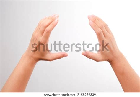 Female Hand Gesture Holding Something Isolated Foto Stock