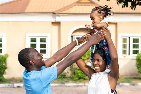 Free Photo Father Holding Kid Medium Shot