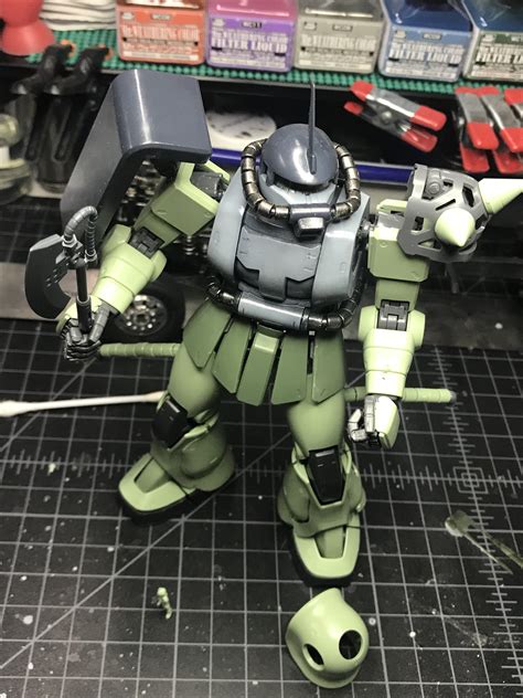 Zaku II, time to disassemble and finish painting. The naval gray will ...