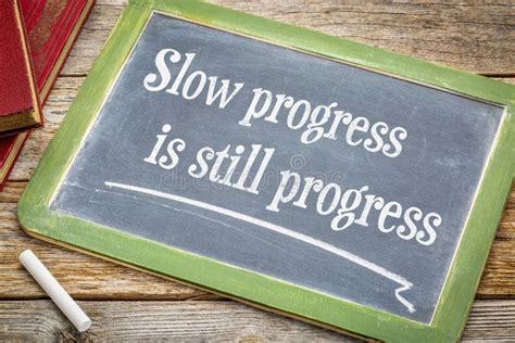 Slow Progress Is Still Quote On Blackboard Stock Photo Image Of