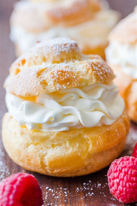 Cream Puffs Are A Classic French Dessert Filled With Sweet Cream And Dusted With Powdered Sugar