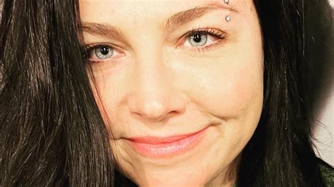 Amy Lee S Evanescence Putting Your Eyebrow Piercing Back In