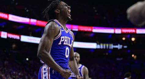 Maxey Embiid And Harris Power Ers To Win Over Nets