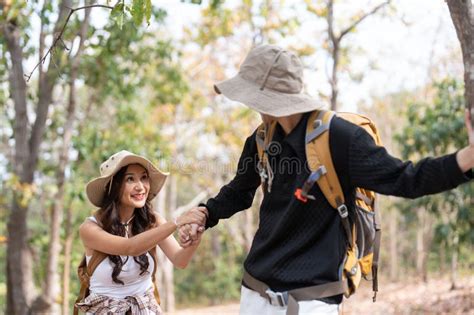 Lovely Couple Lesbian Woman With Backpack Hiking In Nature Loving Lgbt Romantic Moment In