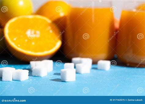 Sugar Content In Fruit Juices Sugar Cubes And Glasses Of Multifruit