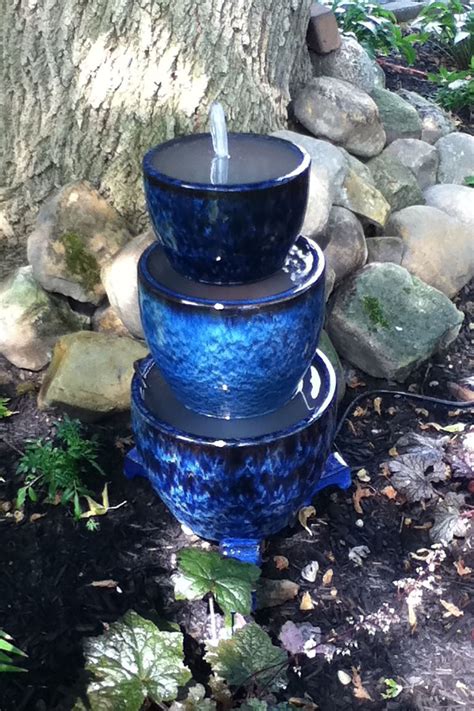 18 Outdoor Fountain Ideas - How To Make a Garden Fountain for Your Backyard