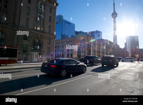 Downtown Traffic In A Busy Street Corner Stock Photo Alamy