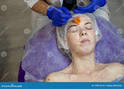 Beauty Clinic Woman Gets A Professional Facial Procedure Beautician