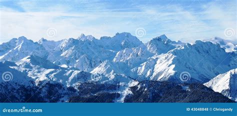 Winter Alpine Mountain Range Under A Blue Sky Stock Photo Image Of