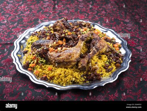 Traditional Fried Arabic Chicken Majboos With Chicken Leg And Jeweled