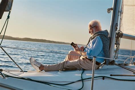 Spending Some Time Alone Side View Of A Relaxed Senior Man Sitting On