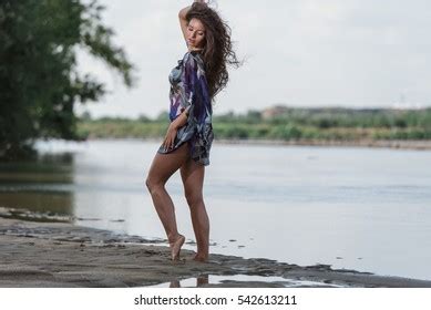 Thoughtful Nice Brunette Wearing Pink Swimsuit Stock Photo 137169626 Shutterstock