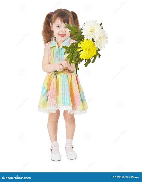 Criança Alegre Que Acena Um Ramalhete Das Flores Imagem de Stock