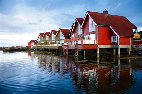 Camping cabins on a fjord — Stock Photo © dnaumoid #13741903