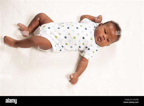 Newborn tonic neck reflex hi-res stock photography and images - Alamy